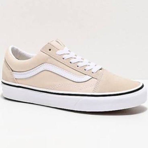 cream and white vans